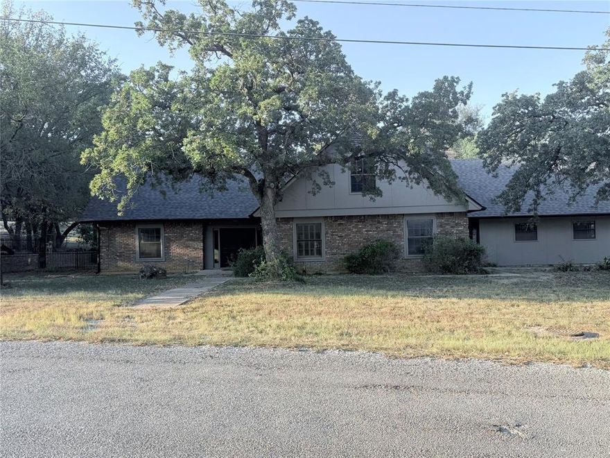 Come enjoy peaceful living near beautiful Lake Bridgeport in the quiet community of Runaway Bay.  This 2802 sq ft home is immaculate.  With 4 bedrooms, 3 bathrooms and three fireplaces, priced at only $148 per sq ft, this home is truly a rarity in today's market.  Inside space is something to be proud of with tasteful updating.  From the primary bedroom, located on the 2nd floor, step outside onto the large terrace for morning coffee or simple relaxation.  From the outside, this custom-built home has outstanding curb appeal and is surrounded by anear one-half acre of manicured grounds.  The back patio includes a built-in wine bar and a view of the currently closed golf course.  For the outdoor enthusiasts, Lake Bridgeport is moments away where you can find outstanding fishing, skiing, or recreation boating.  Come see this truly outstanding property soon as it shouldn't be on the market long.