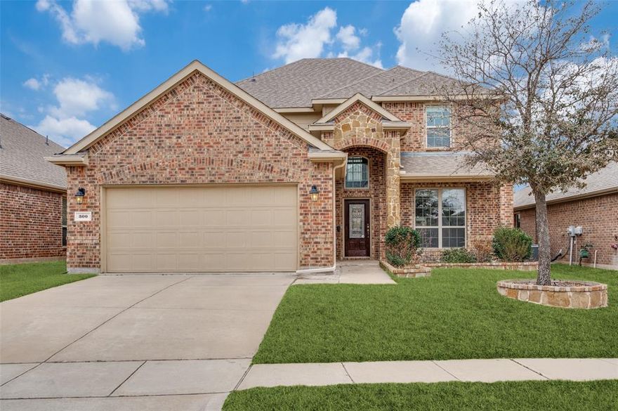 This thoughtfully designed 4-bedroom, 2.5-bath home with an open layout and abundant natural light, and generous storage is the perfect place to call home! Conveniently located near neighborhood parks, trails, shopping, dining, and highly regarded Prosper schools, with easy access to major roadways and community favorites, 300 Whitman Dr. offers the perfect balance of everyday convenience and a connected, active lifestyle.  The main floor features an open floor plan with seamless sightlines between the living room, eat-in kitchen, and dining spaces. The living area is highlighted by vaulted ceilings, floor-to-ceiling windows, and a fireplace, creating a bright and welcoming focal point. The eat-in kitchen includes a large pantry and ample cabinetry, offering excellent storage and functionality. A formal dining room sits nearby for hosting all those special occasions. The spacious primary suite, also on the main level, includes an ensuite bath with a double-sink vanity, soaking tub, separate shower, and a walk-in closet. A conveniently located half bath completes the main floor.  Upstairs, an open staircase leads to a versatile game room or secondary living area, along with three generously sized bedrooms, each with excellent closet space, and a full bath, providing flexibility for family, guests, or home office use. Additional highlights include storage thoughtfully integrated throughout the home, a garage equipped with electrical for an electric vehicle, and a flat backyard with a covered patio, offering the ideal foundation for outdoor living and entertaining.  An excellent home in a prime location ready for your personal touches!