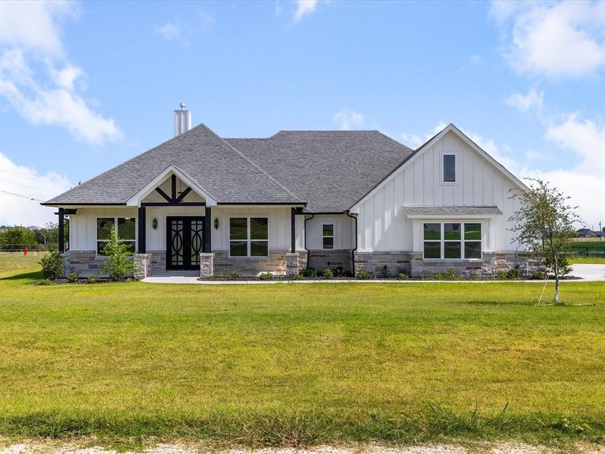 Welcome to this stunning custom home on 1 acre in the sought-after community of Godley, TX! Listed at $555,000 and appraised at $560,000 in April 2025, this property offers instant equity and incredible value. This thoughtfully designed home features 3 bedrooms plus an office with a closet that can easily serve as a 4th bedroom, providing flexibility for guests, multi-generational living, or a private workspace. The open-concept living area is highlighted by soaring ceilings, a dramatic floor-to-ceiling stone fireplace, and abundant natural light. The chef’s kitchen boasts granite counters, a gas cooktop, stainless steel appliances, and an oversized island perfect for entertaining. The primary suite is truly one-of-a-kind, with a customized design featuring dual private toilets (his & hers), two separate walk-in closets, and a spa-inspired bath with soaking tub and walk-in shower. Additional highlights include a spacious laundry room with built-in cabinetry and counter space, covered front and back porches for Texas evenings, and designer finishes throughout. Sitting on a full acre, you’ll have room to expand, add a pool, or simply enjoy the peaceful country setting — all within 5 minutes of Godley Elementary, Middle, and High School. This home perfectly balances modern luxury with functional design — a lifestyle you won’t want to miss!