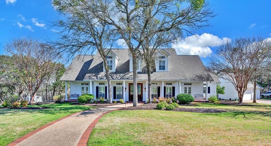 Welcome to 675 Cedar Canyon Road, a peaceful and private 16.12 acre retreat in the heart of Texas! Here, you'll find a four bedroom home, with multiple flexible living spaces and a detached three car garage with a bonus room. Entertain friends and family on the terrace with distant views through the treetops and an outdoor kitchen and pool, or at the river house, with horseshoe pits, a fire pit, and approximately 1,500 feet of North Bosque River frontage. Storage space is plentiful with a barn, implement shed, and huge climate-controlled workshop. There's even a comfortable place for your pets, with a dog run, and an air-conditioned dog house. Midway Independent School District. A rare opportunity for a one-of-a-kind property - schedule your private showing today!