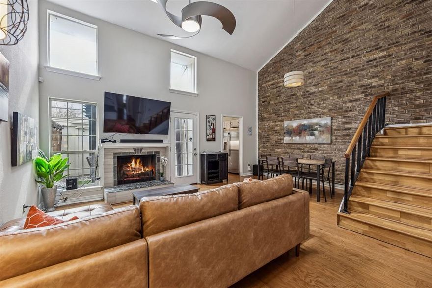 Just one block from award-winning Mockingbird Elementary School, this beautifully updated townhouse blends charm, thoughtful design, and an unbeatable location. A dramatic two-story vaulted ceiling & striking mid-century brick accent wall creates an inviting first impression, while the open living & dining spaces are filled w-natural light & designed for everyday living. Extensively remodeled, the home features a reimagined primary suite with 2 walk-in closets, updated baths, & beautifully refreshed kitchen w-modern appliances, new hardware, & distinctive epoxy countertops. Engineered hardwood floors complement the home’s original oak floors, adding warmth & character throughout. Outside, the roof & front façade were completely redesigned for a clean, modern look, while solar panels w-assumable lease provide energy efficiency. Located minutes from SMU, White Rock, Lakewood, Downtown, & Uptown, the home offers exceptional accessibility. Short-term rentals are allowed, creating a rare opportunity for flexibility or income potential—especially with the upcoming World Cup. A rare combination of location, updates, and opportunity—perfect for homeowners and investors alike.