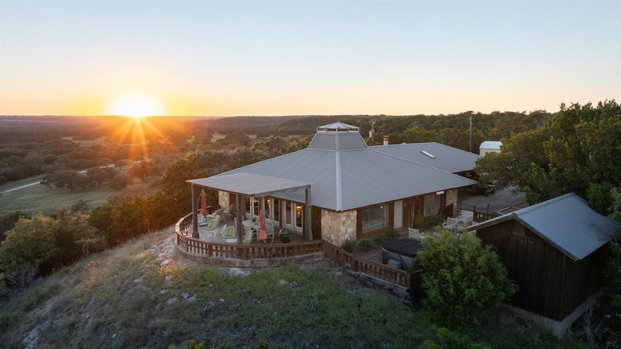 Imagine savoring every sunrise and sunset from your home atop the high elevation, overlooking your immaculately maintained turn-key ranch in the historic Norse District of Bosque County. The nicely appointed 2,000 sf home has 3 bedrooms and 3 baths, and spacious living and dining areas accented by a large rock fireplace, vaulted ceilings and loads of natural light. Multiple patios and porches expand the living space to the outdoors. The second home, constructed in 2010, is approximately 1,750 sf with an open floor plan and space to accommodate 7 guests. 

A 3-stall metal horse barn with electricity and water is ready for use. There are 6 deer pens in place from the previous breeding operation. The ranch is completely high fenced.

Excellent fishing opportunities await the new owner in the 5+ acre lake and the 2+ acres flooded habitat is ideal for duck hunting. The numerous ranch released deer exhibiting top quality genetics from the previous breeding operation are still in place. All other native wildlife species are found on the ranch including turkey, ducks, dove, hogs and varmint. This ranch offers opportunities for hiking, ATV trail riding, horseback riding, a shooting range and simply enjoying the beautiful views from the back deck of the main house.

Over a half a mile of Gin Branch creek runs through the southwestern portion of the property creating a 5+-acre lake and a 2-acre flooded waterfowl habitat. The ranch has two additional ponds and two stock tanks.

The rolling terrain offers an amazing elevation range from a low of 820 ft to a peak of 960 ft with areas of both open pasture and wooded cover.

The furniture in each home will convey with an acceptable offer. Contact Agent for a list of equipment that will convey with an acceptable offer.

The ranch is currently used for hay production. There is a pipeline easement in the northeast corner of the property.