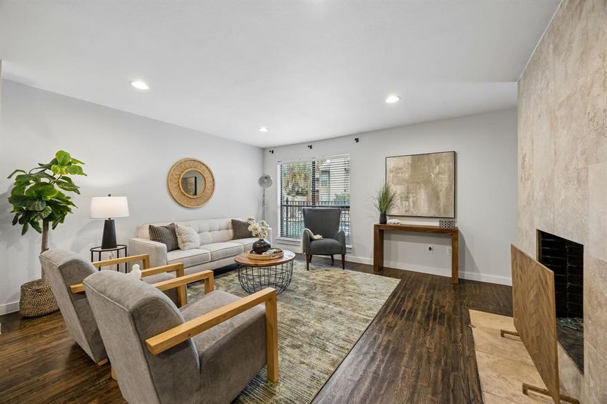 Charming ground-floor unit with poolside views and a spacious open floorplan! Enjoy a bright and inviting living area with large windows overlooking beautifully landscaped grounds. The private patio offers a perfect spot to relax outdoors. Inside, you’ll find thoughtful finishes including hardwood floors, granite countertops, stainless steel appliances, and a gas fireplace. The gated community features a resort-style pool and spa, outdoor grilling areas, a firepit, and mature palm trees that give the space a relaxed, vacation-like feel. Conveniently located in the heart of central Dallas, this unit also includes two assigned, covered parking spots. Only 2 blocks from Central Market, Tom Thumb, LA Fitness, and Old Town shopping center