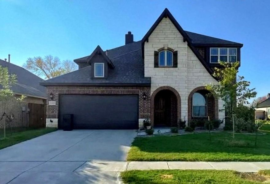 Welcome to this stunning and spacious 3,241-square-foot home located in the desirable and newer Ridge Ranch community. This meticulously maintained residence features five large bedrooms, three full bathrooms, and one half-bath, offering a versatile floor plan perfect for modern living. Situated on a prime corner lot, the home boasts impressive curb appeal with its brick and stone exterior and an inviting interior highlighted by laminate wood flooring, a stone wood-burning fireplace, and a gourmet kitchen complete with updated countertops, stainless steel appliances, and a massive walk-in pantry. The private primary suite is conveniently located downstairs, while the upper-level houses additional bedrooms, and an expansive game room for extra living space.
The Ridge Ranch subdivision offers an exceptional lifestyle with top-tier amenities including a community pool, a playground, and scenic walking and jogging trails for outdoor enthusiasts. This community is perfectly positioned near local parks and within the highly-regarded Mesquite Independent School District.  Outside, the property is finished with an extended covered patio, making it the perfect retreat for relaxing or entertaining guests.