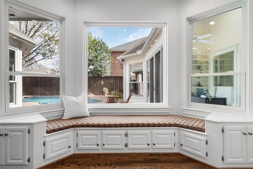 Custom Elegance Meets Everyday Luxury in Bent Tree West! Welcome to this beautifully crafted single-story home nestled in the heart of North Dallas, where timeless design meets modern convenience. Ideally located minutes from George Bush Turnpike & Dallas North Tollway with easy access to premier dining, shopping, Dallas destinations & walking distance to school & community park. Designed for comfortable living & entertaining, this home offers 4 bedrooms, 3 baths, 2 living areas, 2 dining areas, 3 fireplaces, a sunroom & wet bar. Wood floors, Plantation shutters, Venetian plaster, marble, quartz…all upscale finishes throughout reflect quality craftsmanship. The updated chef’s kitchen features quartz & granite countertops, stainless steel appliances & generous cabinetry. Refrigerator is included. The private primary retreat includes a spa-like His & Hers bath with separate shower & jetted tub. The split-bedroom layout provides privacy with a dedicated guest suite. Updated windows! Oversized laundry room! Then, step outside to your own backyard oasis featuring a sparkling pool & spa, perfect for relaxing weekends or entertaining under the Texas sky. Circular drive & canopied trees frame this exceptional home. It’s a lifestyle of comfort, elegance & convenience in one of North Dallas’ most desirable communities.