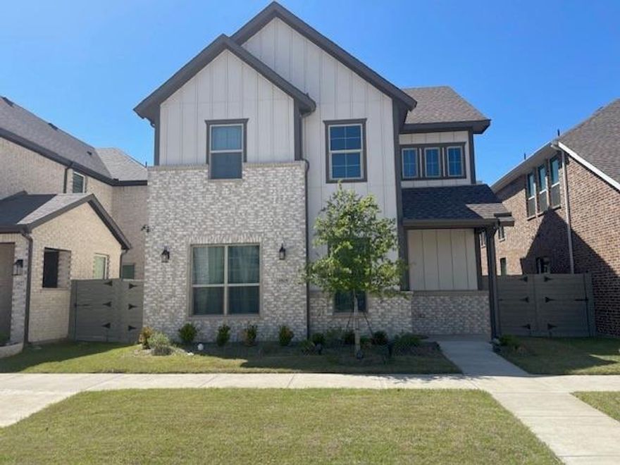 This beautifully crafted brick home is perfectly positioned in The Station at Sachse—one of the area’s most sought-after communities known for its blend of modern design, walkable convenience, and small-town charm. From the moment you step through the door, you’re greeted by a warm and elegant foyer that opens into a stunning, light-filled living area with soaring ceilings and an effortless open-concept flow. The heart of the home is the gourmet kitchen, featuring premium stainless-steel appliances, sleek quartz countertops, a custom tile backsplash, and a large center island perfect for casual dining or entertaining guests.

The spacious living room invites comfort and connection, with oversized windows that bathe the space in natural light and highlight the home’s inviting ambiance. Upstairs, the primary suite offers a peaceful retreat complete with a spa-inspired bathroom boasting a luxurious garden soaking tub, separate oversized glass shower, dual vanities, and a generous walk-in closet. Two additional bedrooms on the second floor are thoughtfully designed for family or guests, offering comfort, privacy, and ample storage.

Downstairs, a versatile bedroom can easily serve as a guest suite, home office, or creative space—providing flexibility to suit your lifestyle needs. Outside, enjoy a private backyard perfect for morning coffee, weekend barbecues, or quiet evenings under the Texas sky.

Located just minutes from Firewheel Town Center, top-rated schools, dining, entertainment, and scenic walking trails, this home combines upscale living with everyday convenience. With its modern finishes, prime location, and thoughtful layout, this property offers the perfect balance of style, comfort, and functionality—ready for you to make it your own.