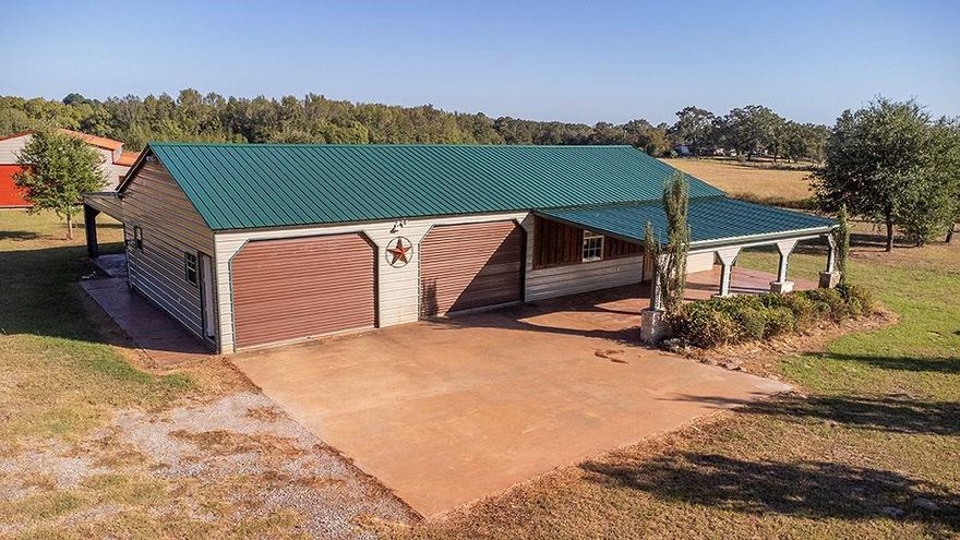 Welcome to Your Country Getaway! This cozy 2-bedroom, 1-bath barndominium with an oversized 2-car garage is ready for its new owners! It’s the perfect fit for someone looking to downsize or for a small family wanting a little space to spread out and enjoy country living. Inside, you’ll find easy-care concrete floors and an open-concept kitchen and living area that make the home feel bright and spacious. Enjoy the outdoors on the large covered patios at both the front and back of the house—great spots for relaxing or gathering around the built-in fire pit. With no restrictions, you can truly make this property your own. Bring your horses, cattle, chickens, or any other animals you love. The 10+ acres include two ponds, partially wooded land, and an Ag exemption already in place. There’s also a large barn with enclosed areas perfect for storage, a workspace, or even small offices, plus a lean-to for livestock. A private well is already on-site, and the property is partially fenced and ready for you to move right in. You’ll be conveniently located near Emory, Quitman, Mineola, and Grand Saline, giving you the peace of the country with easy access to nearby towns. Come take a tour and picture yourself enjoying the quiet, open space of this beautiful ranchette!