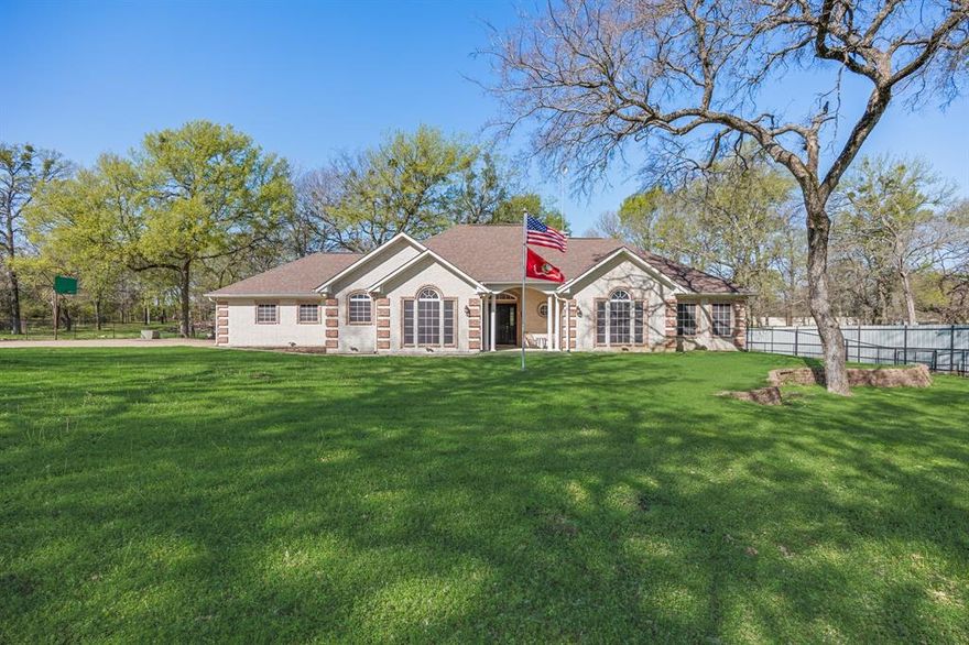 Welcome home to peaceful country living in Wills Point, where wide open skies and quiet surroundings 
create the perfect place to settle in and relax. Situated on a spacious, fully fenced and gated property, this 
home offers privacy, room to spread out, and a slower pace of life with easy access to I-20. Inside, the 
home feels warm and inviting with a comfortable living space centered around a wood-burning fireplace, 
perfect for cozy evenings at home. The kitchen has been tastefully updated with granite countertops and 
modern appliances, creating a space that is both functional and welcoming for everyday living and 
gathering with family and friends. The home has been well cared for over the years, including a recently 
updated HVAC system to keep things comfortable year-round. Outside, you'll find plenty of room to enjoy 
the outdoors with open space, a few scattered trees, and space to make your own. The property also 
features an oversized attached garage, additional storage building, and a generator plug-in for added 
peace of mind. Residents of the neighborhood enjoy access to a private gated lake, offering a quiet place 
to fish, relax, or simply take in the scenery. Whether you're looking for space, privacy, or a place that truly 
feels like home, this property offers a wonderful opportunity to enjoy the charm of country living.