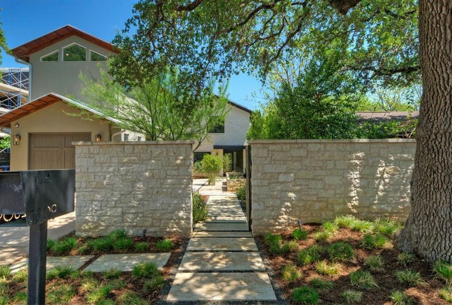 This beautifully renovated Central Austin property offers a rare blend of luxury, comfort, and flexibility across more than 2,800 sqft of living space. The primary residence features nearly 2,200 sqft of thoughtfully designed interiors, including 3 bedrooms, 2.5 bathrooms, an impressive chef’s kitchen, and two distinct outdoor entertaining areas. Taken down to the studs and completely rebuilt in 2021–2022, the home showcases high-end finishes that strike the perfect balance between modern elegance and inviting warmth.

Step outside into your private oasis, complete with a sparkling pool, soothing hot tub, screened-in porch, and a spacious second-floor deck—ideal for entertaining or unwinding under the stars.

A charming courtyard leads to the detached 658 sqft casita, renovated in 2015, which offers two fully equipped studio apartments—each with a full bathroom. The upstairs unit includes a living area and full kitchen, making the casita perfect for guests or generating rental income. A custom walkway connects the upper levels of both buildings, blending beauty with functionality.

Located next to the iconic Mattie’s at Green Pastures and the soon-to-open 63-room boutique hotel and event venue, this home places you at the heart of South Austin’s thriving culinary and cultural scene. You’re just minutes from South Lamar, Hwy 71, I-35, and downtown Austin—less than 3 miles away.

Additional highlights include a new 8MW solar-paneled roof and two Tesla PowerWalls, offering impressive energy efficiency and potential off-grid capabilities with mindful energy management.

Whether you're looking to entertain, relax, or immerse yourself in the best of Austin, this one-of-a-kind property delivers on every front.