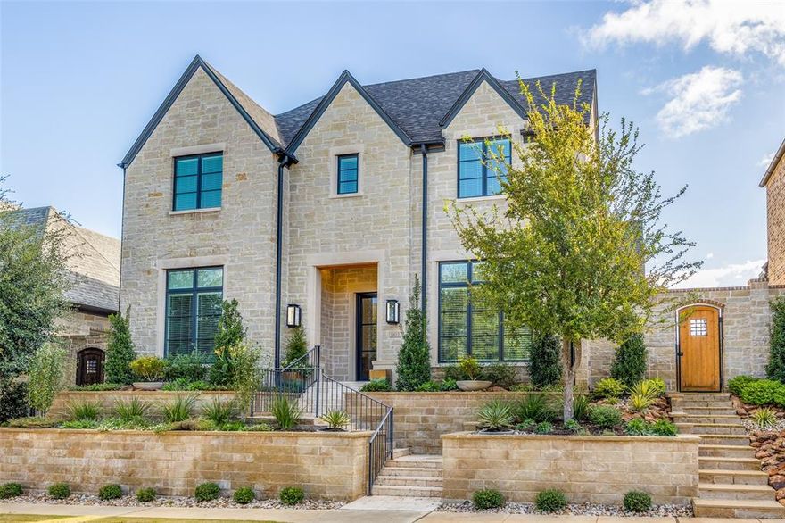 Discover elevated living in Normandy Estates, a gated and guarded community.  Step inside to an open-concept layout with 19-ft vaulted ceilings in the family room and kitchen. Natural light floods through skylights, illuminating an oversized island, high end quartz countertops, beautiful shaker cabinets, wine fridge, and a custom range hood. The first level has the primary suite, guest bedroom, and an office. Primary bathroom is absolutely stunning! Upstairs, a versatile flex or media room and a guest bedroom. Unique high-end light fixtures throughout. Entertain outdoors on your covered patio with a built-in gas grill, retractable motorized porch screen, skylights, and wired audio or video. Practical features include spray-foam insulation, substantial walk-in attic storage, pre-wired for speakers, whole house Wi-Fi mesh, and low maintenance beautifully landscaped yard. As a Normandy Estates residence, enjoy access to a residents-only amenity center featuring a clubhouse with fitness center, community pool, pavilion with outdoor grilling, and scenic trails around ponds and fountains—all nestled within a secure neighborhood. Located minutes from the Dallas North Tollway, Sam Rayburn Tollway, Legacy West, and Shops at Legacy offering convenience to major highways, shopping and restaurants.