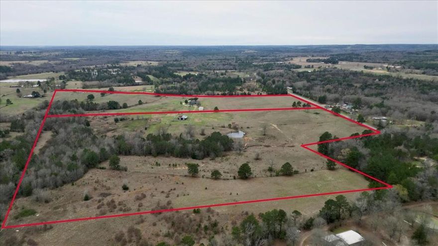 145+ or - acres of beautiful east Texas land! This property is fenced and cross-fenced for cattle or subdividing out if necessary. It comes complete with a barn, holding pens, and cattle working pens, Chutes! Over 1000 ft of FM 2015 road frontage, Minutes from FM16 access, Approx. 10-15 minutes from downtown Lindale, 10 minutes from 120 and much more makes this an amazingly convenient location! Don't miss your opportunity to own one of the best properties around! HOME IS NOT INCLUDED WITH THE LAND BUT WILL NEGOTIATE