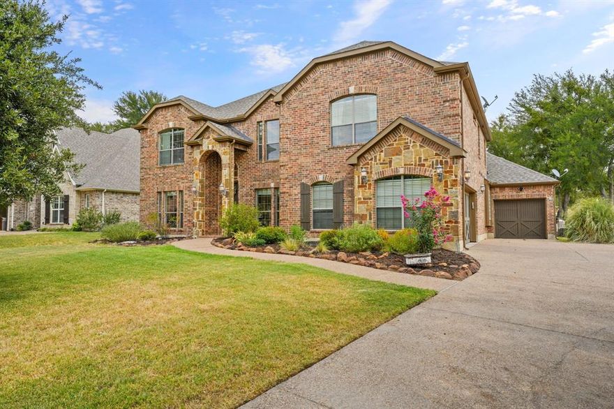 Experience luxury in this 4-bed + office estate with a main-floor primary bedroom, walk-in shower, and soaking tub. Nestled in the gated community of The Resort on Eagle Mountain Lake, revel in convenience and tranquility on a spacious lot over .25 acre. The backyard paradise boasts a sparkling saltwater pool overlooking the first hole fairway, while golf enthusiasts will delight in the separate golf cart garage. Inside, the fully remodeled kitchen is a chef's dream, featuring an oversized island, high-end quartzite countertops, shaker-style cabinets, transitional backsplash, and under-cabinet lighting. The home theater room with stadium-style seating and a 120 inch screen promises cinematic experiences from the comfort of your own home. This beautiful home offers endless possibilities for creating cherished memories, whether hosting poolside gatherings, perfecting your golf swing, or indulging in a movie night.