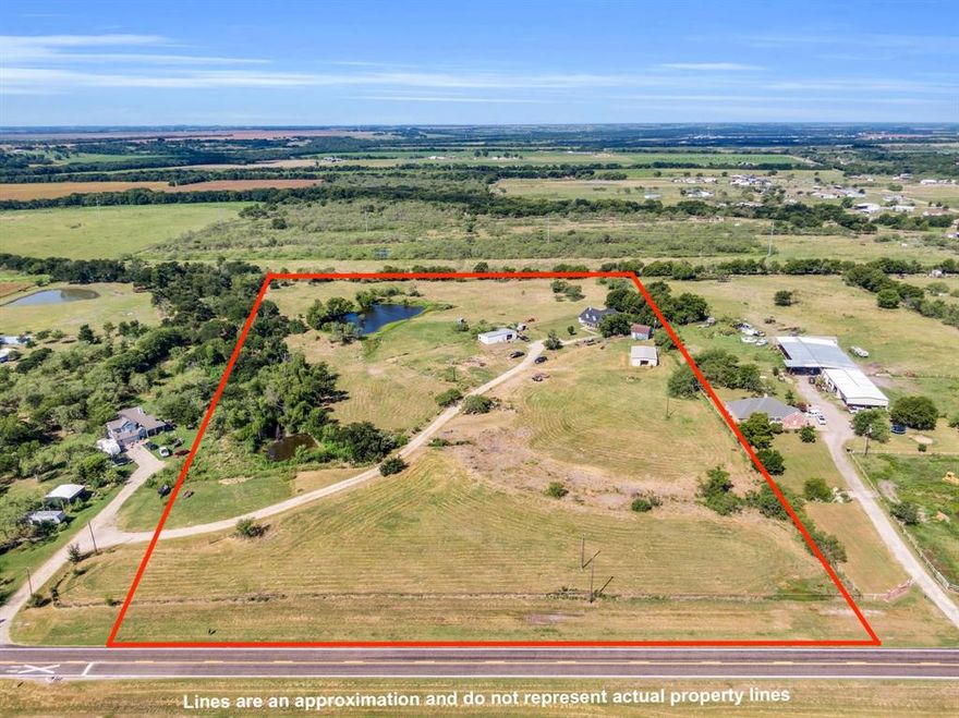 Looking to stretch out and live the country life? This 14-acre property might be exactly what you’ve been searching for. Whether you're dreaming of a homestead, hobby farm, or just some peace and quiet, this setup gives you the space and flexibility to make it happen.
The 3-bedroom, 2.5-bath home offers a warm, functional layout with a cozy brick fireplace in the living room, a spacious kitchen, and a dining area perfect for gathering around the table. Outside, you’ll find a wide front porch for slow mornings and a back patio made for entertaining.
The front of the property is pipe-fenced along the road, and there's a pond out back—ideal for livestock, fishing, or just enjoying the view. Multiple barns and shops are already in place, and with a second electric meter and additional septic system, you’ve got options for adding a guest house, apartment, or shop with living quarters. the property currently shares a driveway, but a private entrance is in the works—adding even more long-term value and convenience. Whether you’re ready to garden, raise animals, or simply enjoy wide open space under the Texas sky, this one is ready to go.