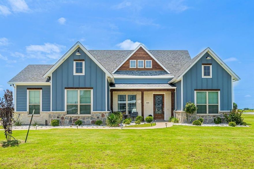 Custom modern farmhouse with fully paid off solar panels offering low monthly electric bills. Located in the Murray Estates addition of Waxahachie on a one-acre corner lot in the county with no rear neighbors. Recent improvements include new roof on home and shed, new carpet, fresh paint, and irrigated landscaping. Open living area with stone electric fireplace and wood beam accents. Kitchen features Calcutta countertops, large island, extended cabinetry, high end appliances, and refrigerator included. Spacious primary suite with ensuite bath, plus three additional bedrooms, two full baths, and dedicated office. Covered patio with outdoor fireplace and storage shed on concrete slab. This home has been very well taken care of it. Pride in ownership shows!