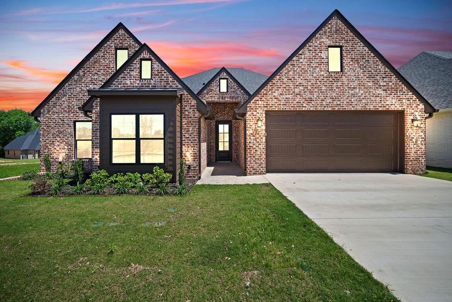 Welcome to your dream home in the highly sought-after Oak Springs community in Tyler! This stunning new construction offers 4 bedrooms and 3 bathrooms, showcasing custom craftsmanship and designer-level finishes throughout. Thoughtfully designed with both style and functionality in mind, the smart layout maximizes every square foot—creating a spacious, open feel with no wasted space. From the moment you step inside, you’ll notice the elevated selections and attention to detail that set this home apart. Outside, enjoy a fully sodded yard complemented by fresh, professional landscaping, delivering beautiful curb appeal and a perfect setting for outdoor living. Ideally located just minutes from shopping, dining, and all that Tyler has to offer, this home combines comfort, convenience, and modern elegance. This is one you truly need to experience in person—don’t miss it!