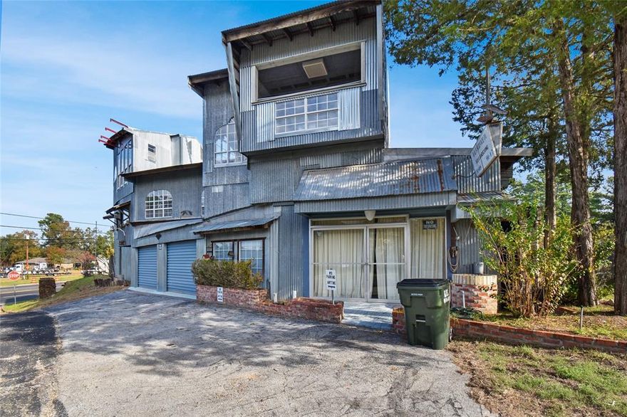 Discover the Tin Castle, a one-of-a-kind approx 20-room property offering unique charm and rustic elegance. This two-story home, crafted with reclaimed materials, features corrugated tin exteriors, warm wood interiors, spacious balconies, and custom glass accents. Situated in a peaceful wooded area, it’s a retreat that perfectly blends creativity with functionality.

Key updates include a brand-new 5-ton HVAC system (indoor and outdoor units) installed in 2023 for modern comfort. The property is being sold as-is, highlighting its distinctive character and potential. 

This is a rare opportunity to own a truly extraordinary home. Reach out today to secure your spot!