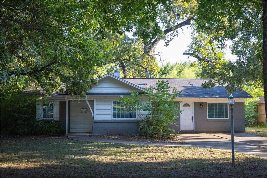 Discover your dream home in the coveted Sunset Heights neighborhood of Fort Worth! This lovely 3-bed, 2-bath residence boasts two spacious living rooms, offering ample space for relaxation and gatherings. Situated on a generous .22-acre lot, the property provides beautiful mature trees for the ultimate in privacy. The updated kitchen complements the home's charm, and natural light floods the living spaces, creating an inviting ambiance. The home offers easy access to major roadways, shopping centers, and dining venues. With all the beautiful updates and great curb appeal, this well-priced gem won't last long.