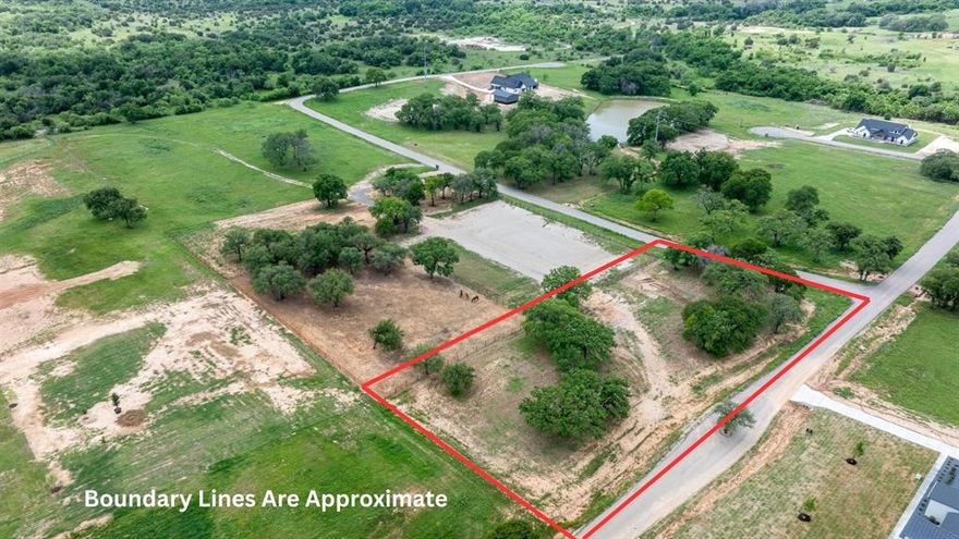 2-acre corner homesite in Santana Ridge Estates located in Brock ISD just outside Weatherford and outside city limits in Parker County. Corner location offers flexibility for driveway placement and home orientation. The property features gently rolling terrain with scattered mature trees and a nice setting for your custom build. Plenty of room for a home, shop, and horses. Enjoy a peaceful rural setting just minutes from downtown Weatherford, Teskey’s, dining, and shopping, with convenient access to I-20 for an easy drive to Fort Worth. Adjacent lot also available – MLS 21084017 (805 Purselley Pass). Combined, the two tracts offer just over 5 acres and may be purchased together. Seller will consider offers for the lots individually or together.