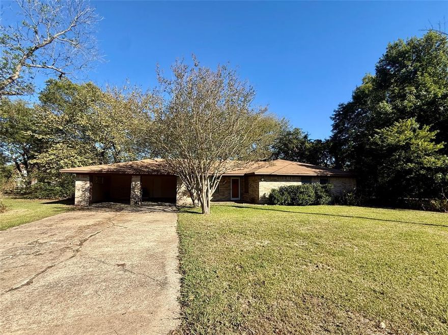 Investors or buyer's wanting to build equity will want to notice this 3 bedroom house on 1 acre on Main Street near downtown Cumby! This home offers potential as a rental income or for turning into a business space. For future equity, a homeowner can apply elbow grease, renovate, and update the property to increase the home's value. The 2-car attached carport could easily be converted into an enclosed garage. A small foyer leads to the living room where the dining room adjoins with an access to the backyard. The kitchen provides lots of countertop space, a breakfast bar, and plenty of storage. From the backyard, a chain link fence plus a treed lot give you shade and room to let your pets roam. Priced to sell only a couple blocks from the center of Cumby!