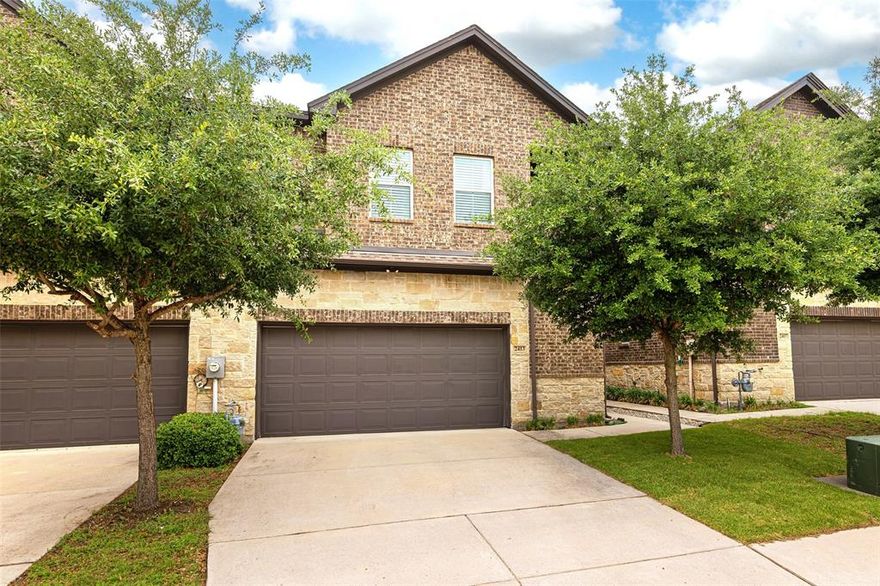 This townhome offers the perfect balance of space, style, and a location that keeps you connected. Designed with a thoughtful, open floorplan and modern convenience in mind, this home feels as functional as it is inviting. Enjoy a lifestyle of convenience where everything you need is right around the corner. You are in walking distance to Armstrong Elementary, grocery, and dining and just minutes from shopping and entertainment at Firewheel Town Center and the PGBT. With four bedrooms and three full bathrooms, there is plenty of room for everyone. Rare for a townhome, one full bedroom with ensuite is located on the main level—perfect for guests or private office. Also on the main level you have a beautiful open kitchen with SS appliances, gas range and granite countertops, pantry and plenty of cabinet space.  Upstairs you'll find three bedrooms, a guest bath and a second living space to use as you please. Inside the primary suite is an ensuite with double sinks, water closet, and large tub and shower combo. The primary also features built in shelving, walk in closet and a private balcony. Let's not forget the two car garage that has extra storage space and room for an extra fridge or freezer. This townhome also showcases a private backyard, with no rear neighbors, that has a patio perfect for grilling. Not to mention, this home is super low maintenance where the HOA fee includes insurance for exterior aspects of the home such as the roof, gutters, fence, irrigation, brickwork and mowing etc. First impressions matter, and this home shines with brand-new sod and professional landscaping.