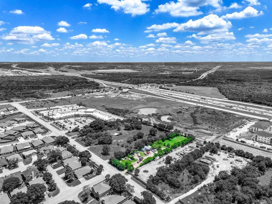 Pleased to present a 1.02-acre development opportunity strategically located in Grand Prairie, TX. Zoned PD-18, this fully fenced parcel offers remarkable flexibility for a wide range of potential uses including retail, multifamily, office, and more. With all utilities available on-site, the property is development-ready and ideally suited for investors or users seeking immediate value and long-term upside. Situated within a high-growth corridor, the property is flanked by two adjacent parcels (1101 & 1105) that have been recently approved for multifamily development—further enhancing the area’s investment appeal and future density. The site benefits from connectivity, located just off Interstate 20 and minutes from State Highway 360, providing direct access throughout the Dallas-Fort Worth Metroplex. It is also in close proximity to DFW International Airport and Union Pacific rail lines, making it a strategic location for logistics, transportation, and distribution. Grand Prairie’s central location, advanced infrastructure, and strong pro-business climate continue to attract significant commercial and industrial investment. With a population exceeding 200,000 and access to a regional labor pool of over 3.7 million, this offering represents a rare opportunity to acquire land in one of the Metroplex’s most dynamic and supply-constrained submarkets.