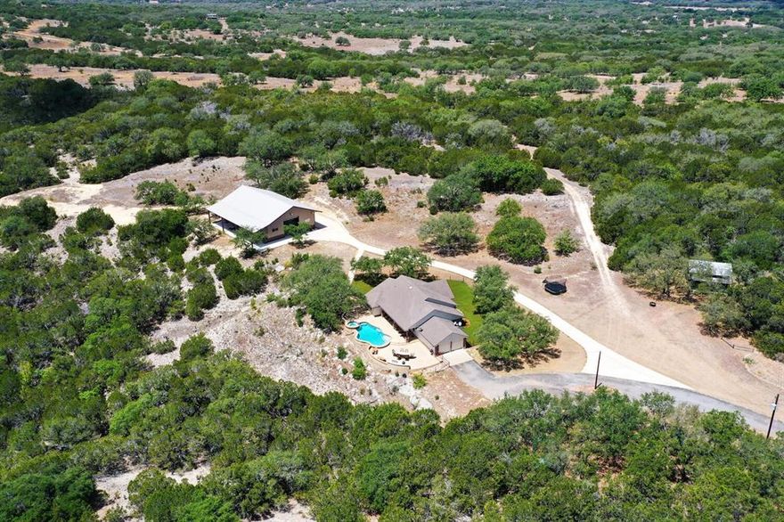Spectacular location, AMAZING VIEWS, & Excellent Ranch Improvements. 171 Unrestricted acres in Cypress Mill. Best deal on a ranch under $5M this close to Austin in A+ location. Turnkey. Improvements consist of 1800 SF totally refurbished home with incredible views, swimming pool & outdoor living area. Rustic guest cabin nearby along with newly constructed 55‘ x 80‘ barn with large covered outdoor entertainment area & indoor basketball court. Located in area of incredibly large scenic ranches. 30 min. to Hill Country Galleria, 45 min. to Central Austin, 20 min. to Johnson City & Vineyard country. Only 20 min. to major shopping, entertainment, restaurants in Marble Falls & Horseshoe Bay resort. Easy access, Hwy 71 to Hamilton Pool over the Pedernales River, 4.7 mi. on left. Multiple build sites for primary home if desired, offering incredible views. Excellent road to main improvements & good ranch roads throughout property. Abundant views & wildlife, wildlife exemptions for low taxes.