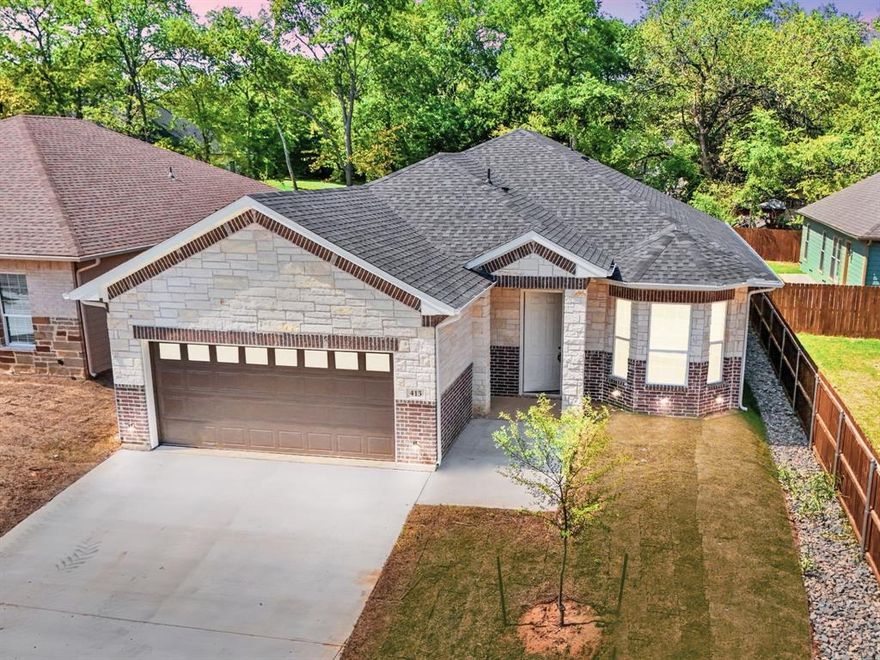 Elevated new construction home with all the extras. We love the refined finishes & architectural details. The thoughtful layout features tall & tray ceilings, decorative cutouts, custom lighting, USB-integrated outlets, premium fixtures, & RC lighting with a spectrum from warm & cozy colors to bright white. 8’ doors, 10’–11’ ceilings are accented by coordinating crown molding. The modern tan & charcoal palette is on-point. The welcoming  kitchen features custom tall, soft-close cabinetry, gorgeous granite, over sink window & all stainless Whirlpool appliances - refrigerator included. Enjoy the view of a sodded yard, privacy fence & planted oaks from the oversized covered patio with resort fan. Energy-efficient construction delivers comfort & efficiency without compromising style. Secluded-feel location walking distance to Powder Creek Park. Minutes to preferred amenities. Ask about the builder incentives tailored to requests for the best fit.