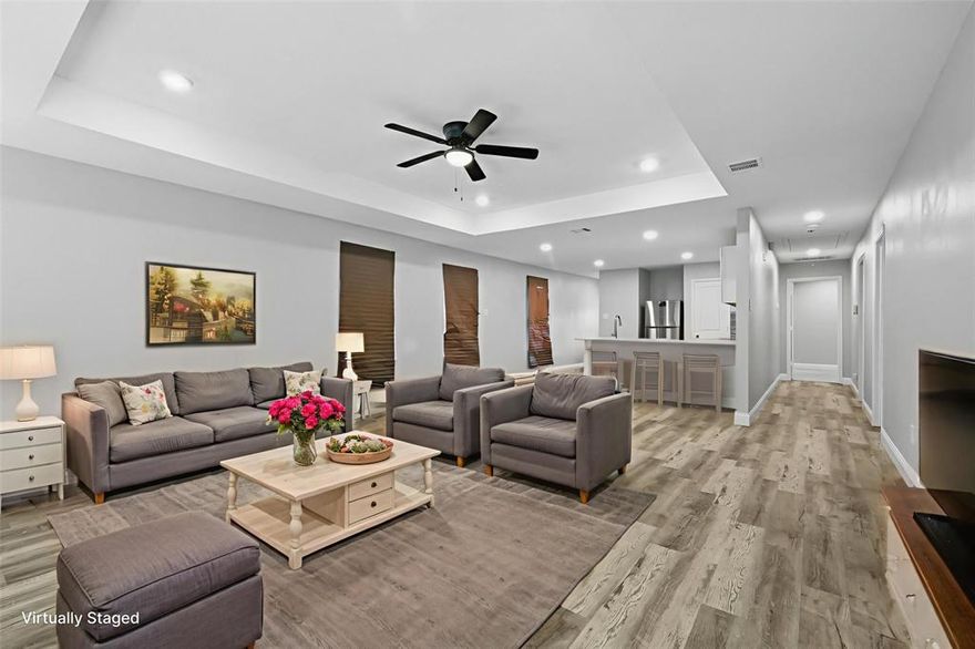 Discover contemporary comfort in this recently built, one-story home nestled in the Liberty Annex neighborhood of South Dallas. Spread across approximately 1,381 sq ft, the home offers an open-concept layout featuring a seamless transition from the living area into the kitchen and dining space, perfect for modern living and entertaining. The kitchen boasts ample cabinet and counter space, encouraging culinary creativity. The primary suite includes a private bathroom and a spacious walk-in closet, while two additional bedrooms provide versatility for guests, family, or a home office. The laminate flooring throughout adds a clean, cohesive aesthetic. Outside, enjoy the privacy of a fenced yard, ideal for morning coffee, evening relaxation, or outdoor gatherings. Completing the package is an attached single-car garage and a driveway for added convenience. Tenant qualifications remain as specified: applicants must have a minimum credit score of 600, a minimum gross monthly income of $6,300, no evictions or judgments, and no felony charges within the past 5 years. Smoking is prohibited. The property is willing to accept Section 8 vouchers, no co-signers, ITIN holders, or subleasing arrangements. Pets are permitted with breed restrictions and a limit on number.