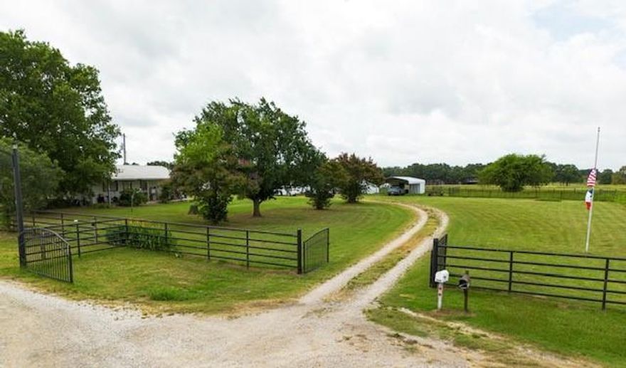 COUNTRY LIVING and PEACEFUL BEAUTY!!!  Here’s your chance to own nearly 2 acres of beautiful country property surrounded by rural charm. This 1.96-acre parcel features a blend of open space, mature trees, and practical outbuildings including a large shop with roll up door and also a great man cave! A welcoming pipe-fenced entry leads to a modest home on the property, though the true value lies in the land and its potential.

Whether you're looking to build new, start a hobby farm, or create a live and work setup, this property offers flexibility in a rural setting with nearby activity and plenty of room to grow. Outbuildings provide covered parking, extra storage, and workspace, while the land is ideal for gardens, animals, or small-scale agricultural use.

Conveniently located with easy access to Royse City, Caddo Mills, and Quinlan, this is a great opportunity for someone who wants space to spread out while staying connected to the community. House needs a little work but it is a bonus to this property.  Bring your ideas and explore the possibilities!

Additional 27.569 acres available but properties do not adjoin. MLS 21000225