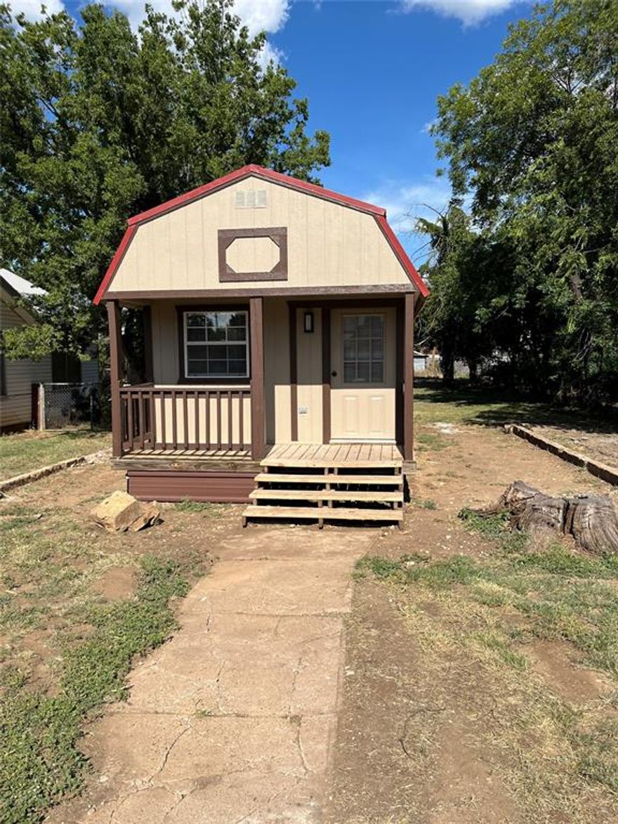Motivated Seller! The Tiny Home in Baird, TX, is a beautifully designed and finished residence on a pleasant lot. It features 1 bedroom, 1 bathroom, and a loft, with two split HVAC units ensuring comfort year-round. The home includes a walk-in shower and is equipped with durable vinyl floors. 

Built on a permanent perimeter concrete foundation, this tiny home boasts high-quality finishes such as solid surface counters in both the kitchen and bathroom, a custom tiled shower, and exposed beams. Multiple remote-controlled ceiling fans with lights add to the convenience and comfort.

The home comes fully equipped with essential appliances, including a stacked washer and dryer, an oven with a glass top cooking surface, a refrigerator, and a microwave. With just a bed and a couch, you'll be all set to enjoy this cozy, well-appointed tiny home.