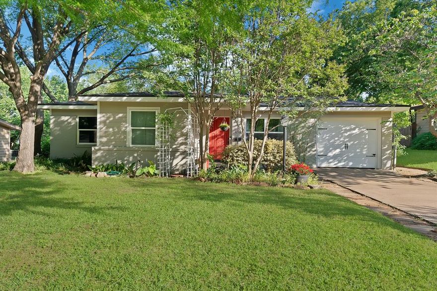 Welcome to 1510 Ravenwood where the updates are done and the curb appeal instantly pulls you in. A beautifully landscaped front yard filled with thoughtful perennial flowers and plants sets the tone, all tucked beneath big mature trees that give this home its charm from the start.

This is a 3 bedroom, 1 and half bathroom home with original hardwood floors that bring warmth and character throughout. You also get a rare blend of charm and peace of mind with a 2 year old roof, updated windows, Hardie Board siding, and a well running AC that has already been taken care of for you.

The kitchen is truly the heart of the home featuring granite countertops and refreshed cabinetry completed just two years ago, plus the cozy bonus of a fireplace in the dining room that makes everyday living feel special.

Out back, the lifestyle continues with a screened in porch overlooking a freshly resurfaced patio and large backyard that is ready for kids, dogs, gatherings, or quiet evenings under the trees.

Need flexibility This home also includes an extra room perfect for a home office, holiday storage, or even the option to convert back to a 1 car garage.

All of this in a highly convenient location within walking distance to Park Row shopping and dining, plus Hill Elementary and Bailey Junior High.

This one has that feels like home energy the moment you arrive.
