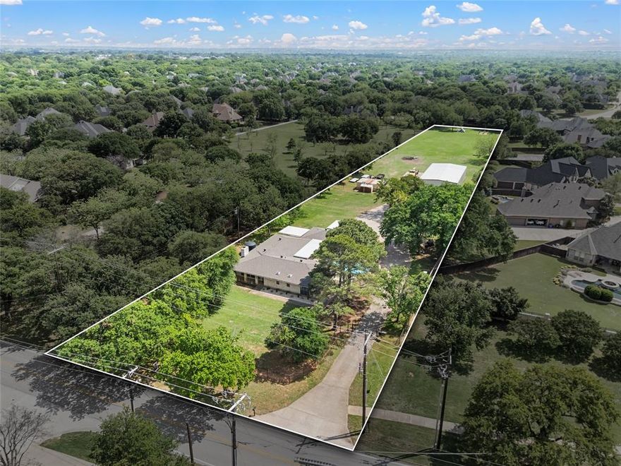 Rare country acreage in one of Colleyville's most desirable settings—convenient to shopping, dining, and major thoroughfares while still offering the privacy and space of true estate-style living.
This home offers “good bones” for either a traditional or mid-century remodel, or enjoy the existing open floor plan as you build your new estate home and retreat you’ve always wanted on this exceptional property.
The approx. 3,200 sq ft metal building is perfect for the car enthusiast to house your collectibles, workshop needs, or additional storage. The building includes an approx. 500 sq ft flex room with full bath, offering a perfect hobby area, spacious office, private guest quarters, or studio space.

Additional highlights include:
* Strong private water well for irrigation with a 3,000-gallon storage tank!
* Large estate lot with metal building
* Grassed pasture ideal for animals or recreation
* No HOA
* Ample room for additional parking, boats, RVs, etc.
A rare opportunity to own versatile acreage in a prime Colleyville location with endless possibilities to remodel, expand, or build your dream estate.

Property feeds into the prestigious Keller ISD with GCISD lottery option availability. Buyer and Buyer’s agent should verify schools and eligibility with the school districts.