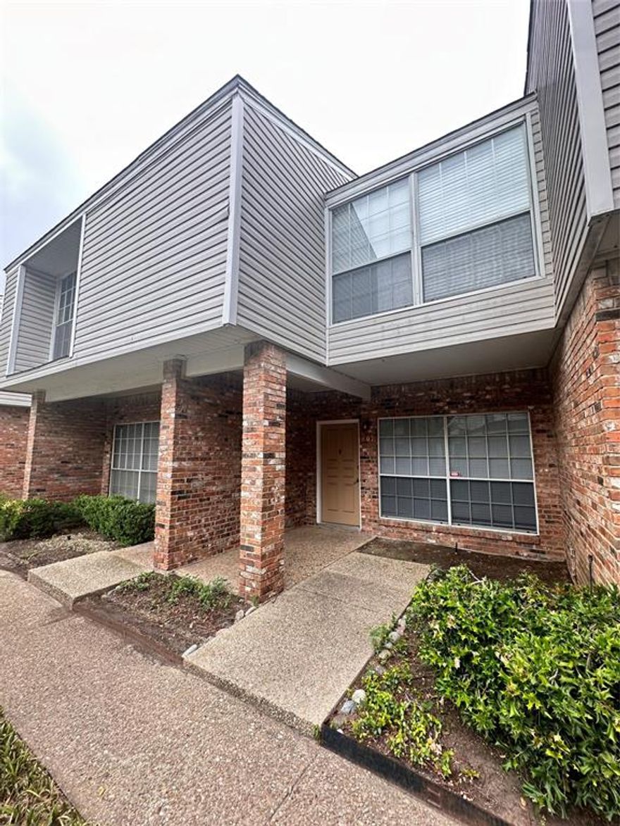 Nestled in a quiet and private community surrounded by mature trees and lush greenery, this beautifully updated two-story condo offers the perfect blend of comfort and convenience. Located just minutes from Richland College, I-635, and Hwy 75, and with shops and restaurants nearby, this home is ideally situated for both tranquility and accessibility. This well-maintained complex offers a community pool, providing a peaceful retreat and privacy fence all around the complex. Step inside to discover a move-in ready condo with brand-new carpet, fresh paint and newly installed 2-inch faux blinds throughout the house. The first floor boasts of stylish wood flooring, giving the home a modern appeal with the natural light creating a warm and welcoming atmosphere. The spacious layout features two generously sized bedrooms, each with walk-in closets, providing ample storage. The open concept kitchen with updated cabinets and countertops overlooks the living room and the separate dining room. The inviting living room features a beautiful fireplace with mantle, adding warmth and character to the space—perfect for cozy evenings or entertaining. The half bath is conveniently located downstairs. The second floor features a convenient linen closet in the hallway which provides additional storage space, perfect for keeping towels, bedding, and essentials neatly organized. The two bathrooms upstairs features granite countertops for a touch of elegance. This home is a rare find in a desirable location. Don’t miss the opportunity to own this charming, move-in ready, turnkey property. Welcome home!