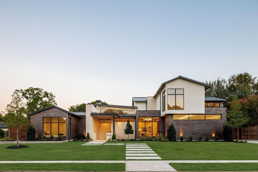 Set on one of Les Jardins most coveted streets in the private school corridor, this newly completed visionary estate reflects a timeless pairing of craftsmanship and modern refinement. 5 bedrooms, 5.5 bathrooms and 5,528 SF of thoughtfully designed living space on a sweeping 0.41 AC corner lot. Designed for both grand entertaining and intimate living, the home's fluid layout and soaring volume is anchored by a striking formal living room, where glass doors erase the boundary between indoors and out. The dining room and chef's kitchen, both equally breathtaking, extend this effortless openness, blending refinement with functionality. High quality construction by KE Homes with interiors by J Collins Interiors is in every moment and detail. The first floor features a luxurious primary suite, an ensuite secondary bedroom, open-concept kitchen, living and dining spaces and a secluded casual living area for relaxed evenings at home.  The chef’s kitchen is a true culinary dream featuring sleek custom cabinetry, Wolf and Sub-Zero appliances and a spacious island.  Upstairs, enjoy an oversized game room with wet bar flanked by three additional ensuite bedrooms.  Enjoy modern luxuries including the dual utility rooms, one on each floor, and the large 3-car garage.  Beyond the interiors, the glistening pool and covered outdoor living area are surrounded by layered landscaping. Perfectly blending modern luxury with timeless elegance, 4242 Reaumur Drive is truly a masterpiece of design and function.