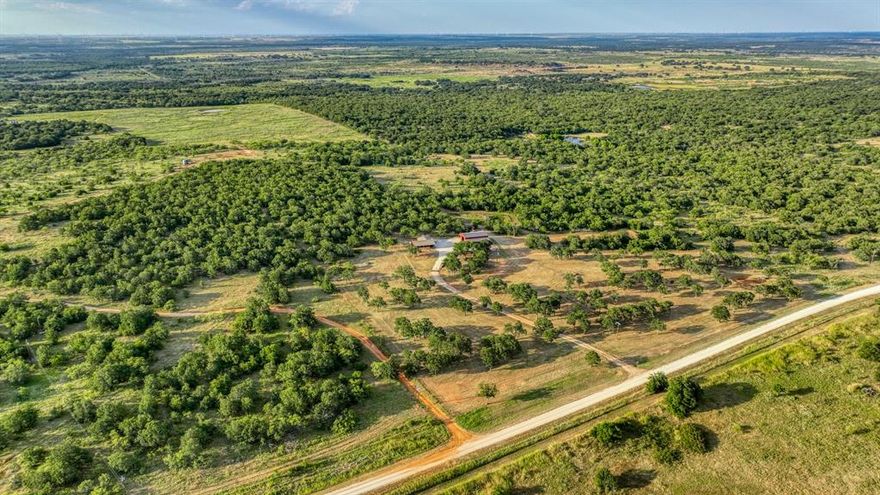 Premier Hunting & Ranching Retreat with Expansion Opportunity. Escape to the perfect blend of outdoor adventure and Texas ranch living on this 318+- acre property in the heart of Young County. Designed for both recreation and livestock, this ranch offers everything from hunting to cattle-ready infrastructure plus the option to expand with an additional 360 adjoining acres available for purchase. At the center of the ranch, a 1,300 sq ft lodge provides the perfect retreat with a private master suite and two guest bunk rooms, ideal for family getaways or hosting hunting parties. Nearby, the impressive 2,000 sq ft insulated man cave with a stone fireplace sets the stage for entertaining and unwinding after a day in the field. For the sportsman, this ranch is fully turnkey, 4 deer blinds 4 corn feeders, and 2 protein feeders already in place. A private shooting range for year-round practice. Excellent wildlife habitat with a mix of open pasture and dense cover For the rancher, you’ll find expansive grazing pastures ready for cattle, Multiple stock tanks plus a 3-acre fishing lake stocked with bass. Working pens located in the north pasture for spring works, Every element of the land is set up for both productivity and recreation, whether you’re running cattle, fishing at sunset, or relaxing fireside after a successful hunt. Opportunities like this are rare, a 318+ acre ranch with lodge, lake, and complete setup in a highly sought-after area, with the ability to expand to nearly 680 acres total. Just a short drive from the DFW Metroplex, this property combines privacy, comfort, and true Texas ranch living.