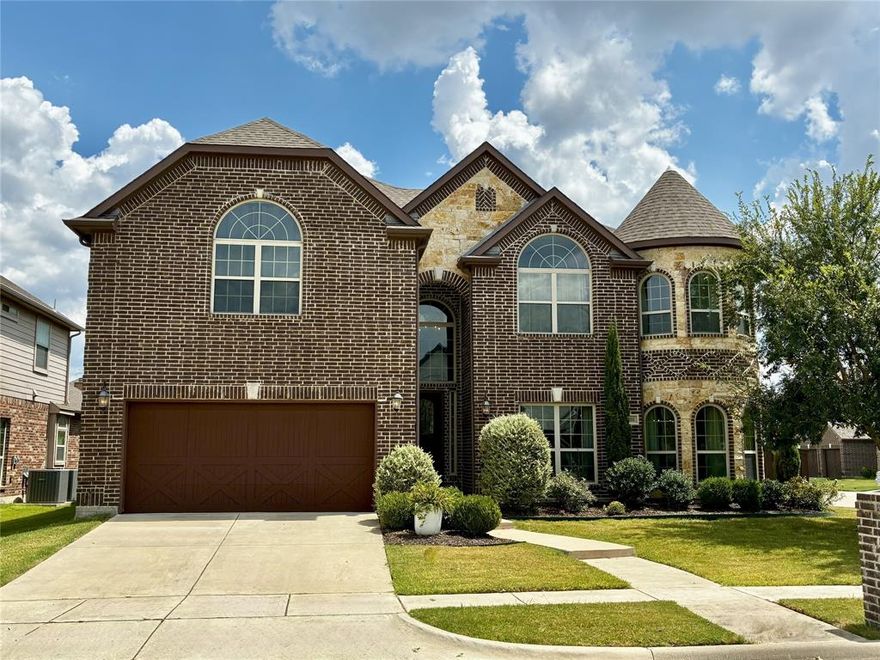 Welcome to Taylor Lane, a stunning 5-bedroom, 4-bath home in vibrant McKinney, TX. Set on a desirable corner lot, it offers a spacious backyard for outdoor living. Inside, enjoy a game room, media room with projector and built-in speakers, a cozy gas fireplace with gas logs, and a private home office. Formal living and dining areas provide elegant spaces for entertaining. Wine enthusiasts will love the 150-bottle cellar. The chef’s kitchen features stainless appliances, granite counters, and a double oven. Hardwood floors flow throughout with plush carpet in bedrooms. Just a short walk to the community pool, park, and elementary school—plus access to top-rated Prosper ISD. Discover the perfect blend of luxury and convenience at Taylor Lane.  Sellers offering $20,000 towards buyer closing costs or rate buydown.