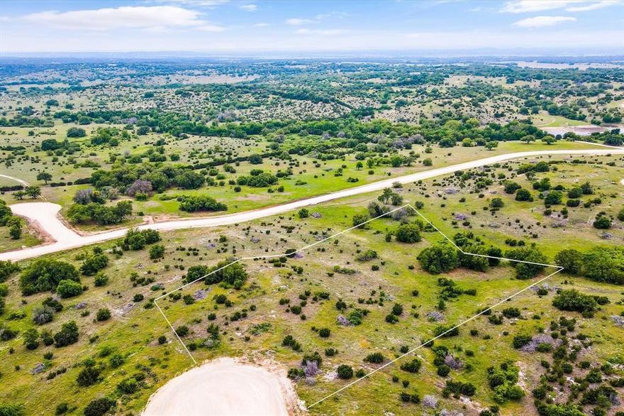 Discover Hidden Valley Ranch, Somervell County’s Premier Acreage Gated Community!  Just a short drive south of Glen Rose, Hidden Valley Ranch offers a peaceful retreat in one of the area's newest residential developments. These expansive acreage lots provide stunning views and a sense of privacy, ideal for those seeking a quiet escape with room to roam. Enjoy the community’s private park featuring a scenic pond, perfect for fishing or relaxing afternoons under the pavilion with picnic and grilling areas. UCS supplies both electric service and high-speed fiber internet, ensuring modern conveniences in a rural setting. Additional amenities include gated entrances, community mailboxes, and well-maintained chip-seal roads.
Lot 137 is a standout—4.21 acres perched on a hilltop with panoramic views, mature oak trees, and a flat, ready-to-build homesite. Watch the sunrise, enjoy abundant wildlife, and experience true Hill Country living. Need more space?  All this, and is located within the highly rated Glen Rose ISD.  You'll also benefit from lower county tax rates—don’t miss your opportunity to build your dream home in Hidden Valley Ranch!