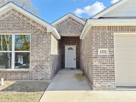 Photo of 1311 Wright St, Greenville, TX 75401 (MLS # 21229617)