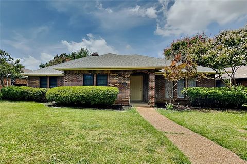Photo of 3213 Sugarbush Drive, Carrollton, TX 75007 (MLS # 21336977)