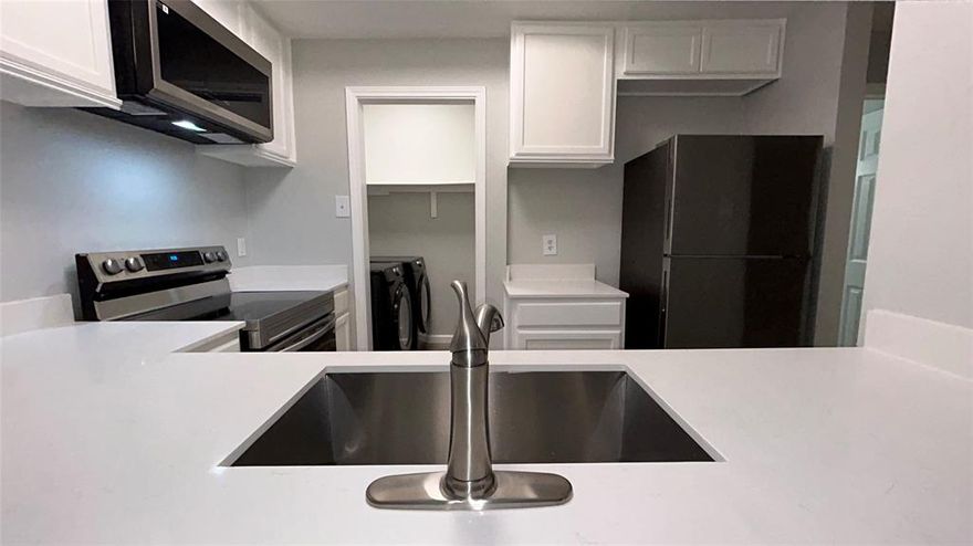 Absolutely everything is new! This beautifully renovated 1-bedroom, 1-bath condo features fresh paint, new doors and hardware, updated cabinetry, brand-new flooring throughout, a new AC unit, stunning quartz countertops, and a luxurious walk-in shower. No detail has been overlooked.

The kitchen boasts brand-new stainless steel appliances, and a new front-load washer and dryer are also included. Located on the ground floor with direct access from the front gate, this unit offers exceptional convenience along with a private patio, easy access to the community pool, and an assigned covered parking space.

Set within a charming, established community with mature trees and lush landscaping, residents enjoy fantastic amenities including a multi-level pool, covered patios, and more.

Homes like this—fully updated and perfectly located—rarely come available. Don’t miss your chance to make this turnkey gem yours!