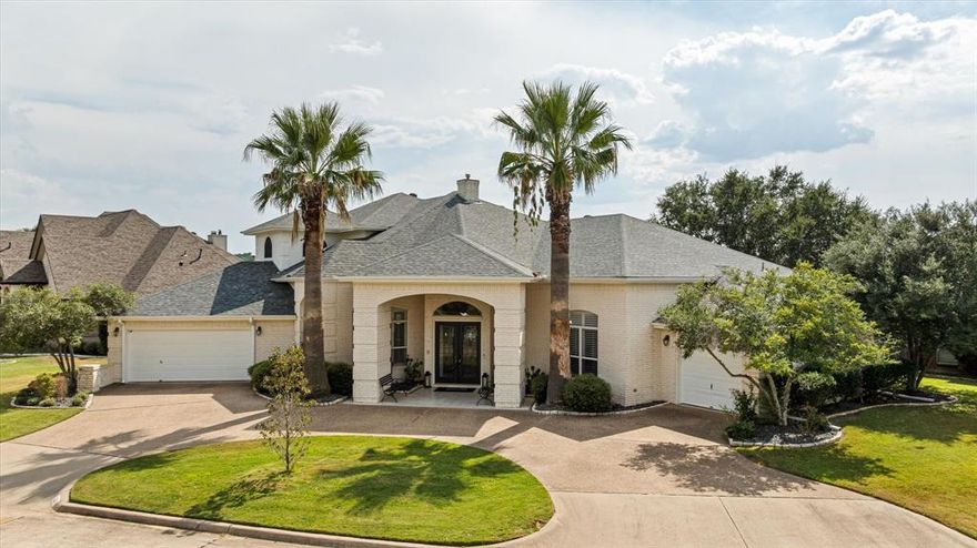 Gorgeous lakefront property that will give you that vacation feel while you're at home!  3333 sq ft of pure luxury living.  This home has multiple living room areas and dining areas to offer plenty of room for those family get togethers, including a large game room upstairs.  All new cabinets have been installed throughout home.  Kitchen has been redone with new countertops, backsplash and all new appliances.  A new pergola was recently added to the upstairs balcony, perfect for those quiet mornings and peaceful evenings.  The home has 4 bedrooms and 3 full bathrooms, all spacious with plenty of room for your family and guests.  Living room has new LVP planks.  Home has been repainted throughout the interior and exterior was recently repainted as well.  Both AC units have been replaced.  Back patio has new tile and the dock has been redone too!  So many updates have been done on this home.  The home has been meticulously maintained and it shows throughout!  So many memories are waiting to be made within this comfortable home!