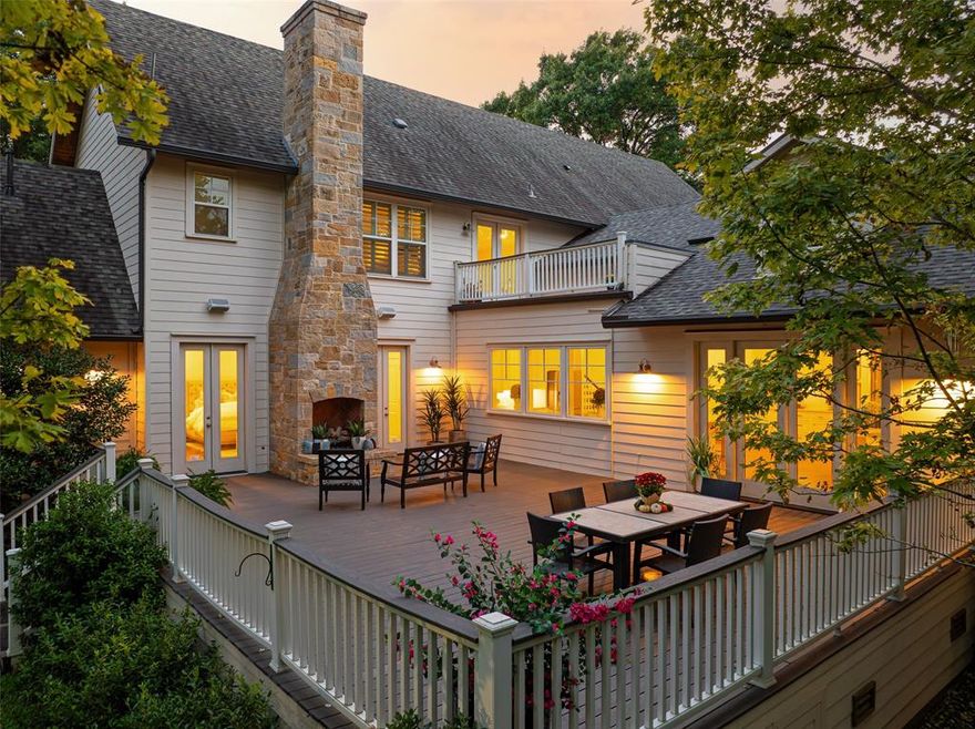 Beautifully set on an oversized, tree-covered lot, this transitional Dallas estate offers modern design, timeless architecture, and exceptional craftsmanship throughout. The open-concept layout features a gourmet kitchen with premium appliances and a large island that flows into a spacious family room with cathedral ceilings and views of the wooded backyard.
Enjoy seamless indoor-outdoor living with a large entertaining deck, outdoor fireplace, and serene natural setting. The flexible floor plan includes a first-floor primary suite, guest bedroom, executive office, and formal dining. Upstairs offers a third living area, bonus room, treetop balcony, and four additional bedrooms—ideal for multigenerational living or remote-work needs.
Located near Love Field, Highland Park Village, Inwood Village, and top private schools, this move-in-ready luxury home provides space, privacy, and convenience in one of Dallas’ most desirable neighborhoods.