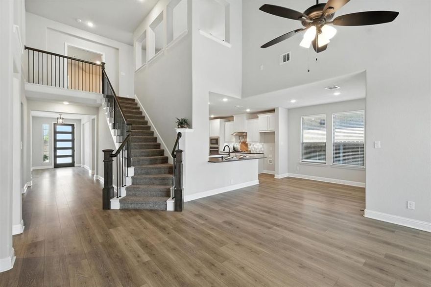 Beautiful, spacious and immaculate 4-bedroom, 3.5-bathroom home in the highly sought-after Somerset community in Mansfield ISD is move-in ready and full of designer touches. Featuring a dedicated dining room, private office, game room, and media room, the home offers plenty of space for work, play, and entertaining with an abundance of natural light. The interior boasts a neutral color palette, dramatic open staircase, upgraded light fixtures, and soft-close cabinets throughout, creating a warm and stylish atmosphere that’s ready for your personal touch. Step outside to a covered patio, perfect for relaxing. This 2022 built home exudes modern charm and curb appeal. Located in a master-planned community with resort-style amenities including a sparkling pool, clubhouse, walking trails, playgrounds, and picturesque ponds with fountains, this home is also just minutes from entertainment, shopping, H-E-B, upcoming Costco, and offers easy access to highways 287 and 360. Priced to sell, this is a must-see opportunity in one of Mansfield’s premier neighborhoods.