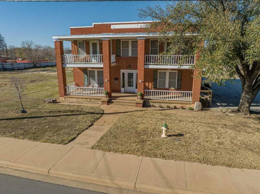 Property initially purchased in September of 1995 configured as four apartments, two upstairs and two downstairs. We renovated from from 4 apartments into a bed and breakfast, featuring a large downstairs kitchen and breakfast noon, with walk in pantry, a formal dining area, two bedrooms and a two room suite, each with separate bath rooms. Upstairs on east side is apartment with living area, two bedroom, a bath room, laundry room and attached metal building (no heat or air). West side upstairs feature a suit with bathroom as well as additional bedroom in the back end with separate bath. Property can remain a rental with income potential through air bnb as we currently have it or converted to a residence. The detached three car garage with two bedrooms and kitchen area can either be renovated or torn down to allow for additional parking. New roof in 2022. Furniture and appliances included with sale.