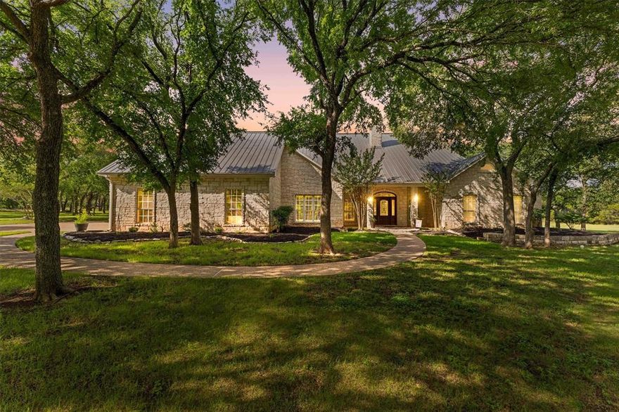 Welcome to your dream home in the highly sought-after Crawford ISD! Built in 2000, this stunning residence boasts 3,399 square feet of elegantly designed living space, perfectly situated on a breathtaking 2.6 acres adorned with majestic trees that provide both beauty and privacy.

Step inside to discover a warm and inviting atmosphere, where spacious rooms and thoughtful layouts create the perfect environment for both relaxation and entertaining. The heart of the home features a large, open-concept living area that flows seamlessly into a gourmet kitchen, perfect for hosting family and friends.
One of the standout features of this property is the expansive back porch that overlooks a serene wooded area, offering daily opportunities for morning coffee or evening sunsets in a tranquil setting. Whether you enjoy gardening, outdoor adventures, or simply soaking in nature, this property provides ample space to explore and enjoy.
Located in the family community of Crawford, you'll find a friendly atmosphere complemented by local amenities, excellent schools, and a strong sense of community spirit. Don't miss this opportunity to own a piece of paradise in Crawford ISD! Schedule a showing today and experience the charm and beauty of this remarkable home for yourself!