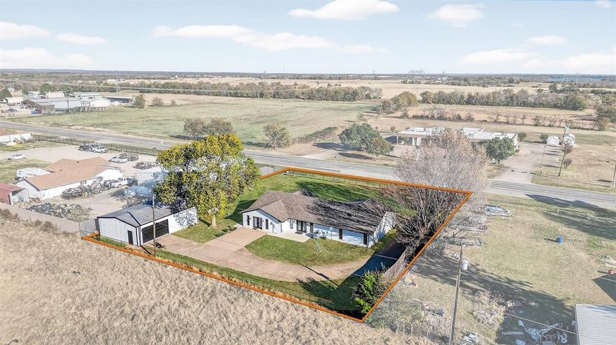 Fantastic location: approximately 24 minutes to Texas Instruments in Sherman, 14 minutes to the Walmart Supercenter, and about 35 minutes to Choctaw Casino. Rustic farmhouse charm meets modern comfort on almost an acre just outside city limits! This beautifully updated 4 bedroom, 3 bath home with large media room offers an open, inviting floor plan and a 1,050 sq ft shop. The kitchen is a chef’s dream with custom cabinetry, striking black granite countertops, 6-burner Thor gas range, KitchenAid refrigerator, wine fridge, and a true butler’s pantry with pocket door, butcher block counters, convection oven, sink, and abundant storage.

The spacious primary suite features an en suite bath with dual sinks, split double-sided walk-in closets, stylish tile flooring, and a walk-in shower. Major updates in 2023 include all new windows, spray foam insulation throughout (including attic), new drywall, all new electrical, new doors, LVP flooring, and a tankless water heater. HVAC was replaced in 2017.

Outdoor living shines with two back patios and a side patio, extended concrete walkways, and a fully fenced yard with entry gate and pipe fencing. The shop offers electric, shelving, and ample parking for a boat, RV, or ATVs. Enjoy true country living OUTSIDE CITY LIMITS with NO city taxes, NO restrictions, and NO HOA, all within highly sought-after Bells ISD. Call your favorite REALTOR® today!!