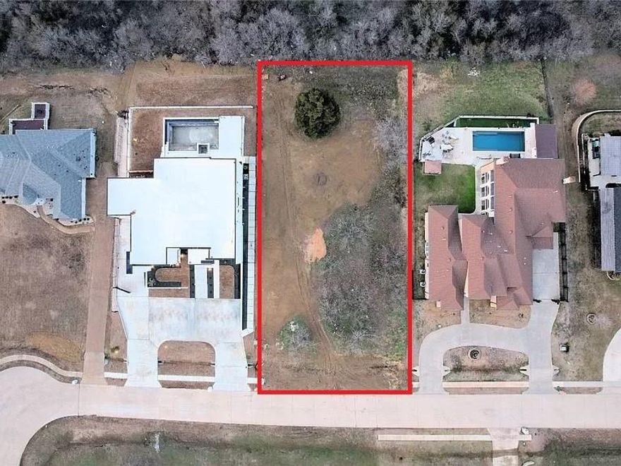 This residential lot is ready for your new build in a premium neighborhood!  This lot is in an exclusive gated community and part of the upscale residential community of Lakeridge!  You will have a beautiful lake side view of Joe Pool Lake!