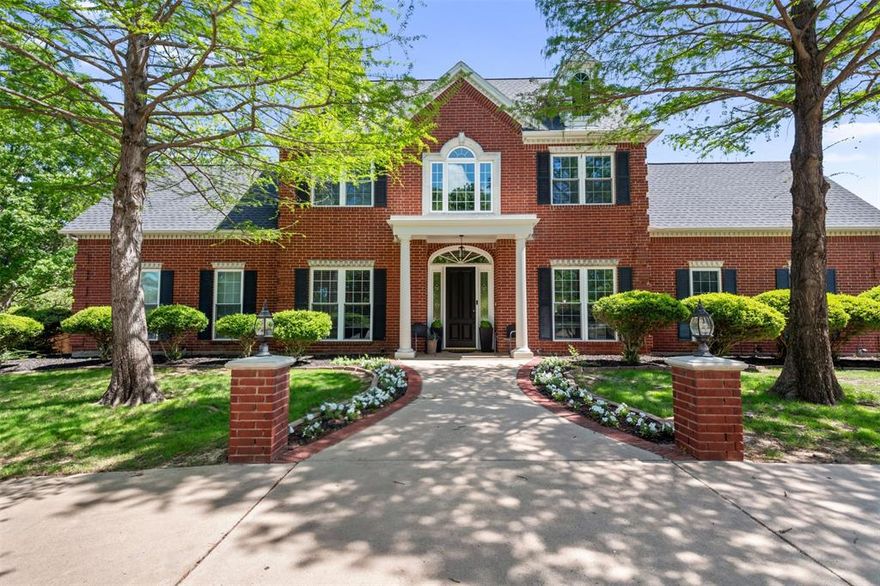 Come home to the prestigious Shadow Wood Estates neighborhood in Argyle with this beautiful 1.77 acre corner lot property, offering prime location within Argyle ISD while at the same time a private, wooded tranquility. This spacious home features 4 bedrooms, 4.5 bathrooms, a dedicated office space, media room, game room and 2 additional large first floor living spaces.

You will be drawn in to the large inviting chefs kitchen and family room space where walls of windows pour in natural light and scenic views of the backyard wooded oasis.  Just off of the kitchen is a first floor media room making entertaining a delight.  The main living areas are flanked by a private bedroom & updated bathroom on one side of the house and the primary suite on the other.  The primary bedroom is a restful getaway full of natural light and boasts a recently renovated bathroom with a large walk in shower, double vanitites and a free standing tub.  A large custom walk in closet space as well as a hidden cedar closet allow a place for everything.

A split stairway is at the heart of the home leading to 2 upstairs bedrooms, each with access to its own updated bathroom and a very large game room space.  With access to multiple attic spaces including a large walk in space, storage abounds in this home!

Stepping outside to the tranquil backyard gives the feel of resort living!  There is plenty of covered and uncovered patio space around the saltwater play pool and spa as well as a cozy firepit area.  Follow the walkway to a 25x35 barn currently being used as a sports getaway with ping pong, a golf practice screen, workout room and basketball hoop.  A second building on property is 20x30 with a 10' high garage door and 12' ceilings with a loft and is perfect as a workshop or extra garage space.  Both of these outbuildings have water and electricity and their possibilities are endless!

Convenient to LCS and zoned for Hilltop Elementary and the new Argyle Legacy HS.