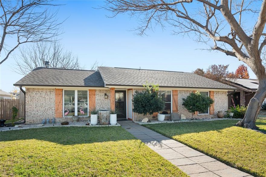 Welcome to this charming three bedroom, two bathroom home in the heart of Lewisville, offering strong curb appeal and thoughtful updates throughout. Vaulted ceilings create an open, airy living space centered around a cozy wood burning fireplace. The kitchen opens to the living area, creating a functional open concept ideal for everyday living and entertaining, and features granite countertops, classic shaker style cabinets, and an eat in bar overlooking the main living space. An enclosed patio extends the living area and provides flexible space for relaxing, entertaining, or enjoying outdoor time year round. The backyard includes a separate storage building for tools, hobbies, or additional storage. The well designed layout offers three comfortable bedrooms and two full bathrooms, allowing flexibility for families, guests, or a home office. Cosmetic improvements such as fresh paint and new flooring can be completed after closing to personalize the home, with strong upside as the after repair value exceeds three hundred thousand. Buyers may wish to explore a 203K renovation loan to include improvements in the mortgage. Located in an established Lewisville neighborhood with convenient access to shopping, dining, and major highways, and with a new roof scheduled to be installed soon, this home offers comfort, value, and peace of mind. Improvements include new windows in 2014, eat in bar added in 2020, dishwasher in 2021, fence in 2022, storage shed in 2022, microwave in 2023, electric range in 2024, and cabinets painted in 2025. Priced with consideration for flooring and paint, this home presents an excellent opportunity to create something special.