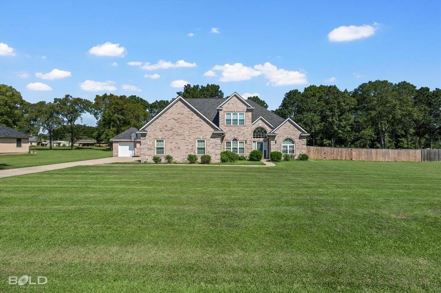 Nestled in a serene Keithville setting, this impressive 2-story brick traditional residence offers over 3,360 sq ft of spacious, thoughtfully designed living space. Featuring 4 generous bedrooms, 2.5 baths, and a cleverly laid-out 11-room floor plan, this home artfully combines functionality and refined comfort. Step inside to discover elegant finishes throughout—high ceilings, abundant natural light, and a seamless flow that connects living, dining, and entertaining areas. The attached garage provides convenient access and adds to the home's practicality. Outside, a beautifully maintained brick exterior blends classic curb appeal with modern lifestyle needs. This property is a rare find in the Keithville market—poised for its next chapter of luxury living.